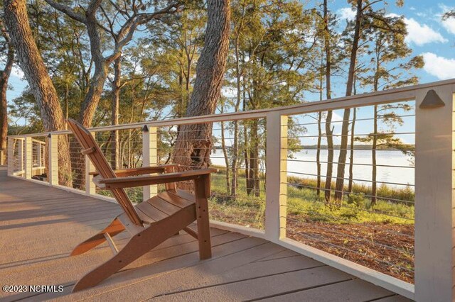 view of home's community featuring a fire pit and a patio