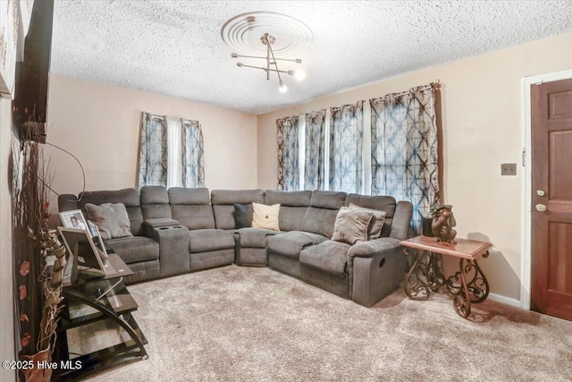 212 Bunche Dr, Goldsboro, NC 27530 - carpeted living room with a textured ceiling