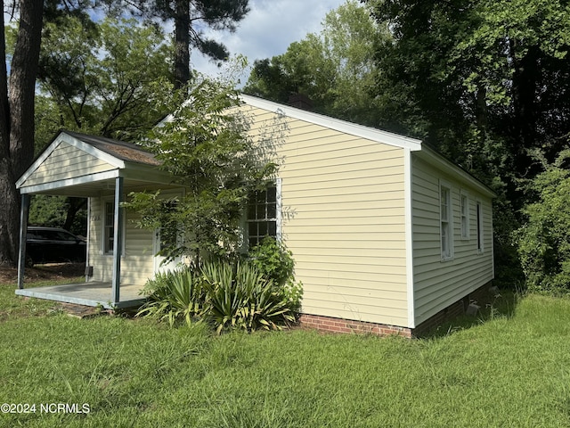 exterior space featuring a lawn