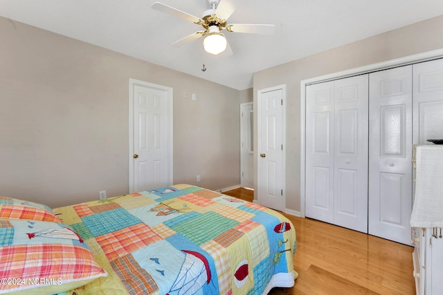 bedroom with light hardwood / wood-style floors and ceiling fan