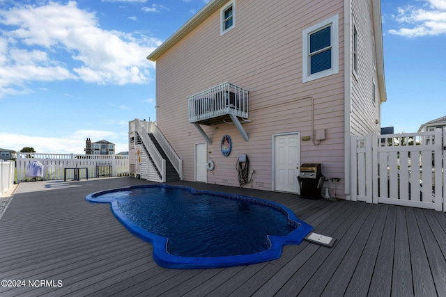 view of pool featuring a deck