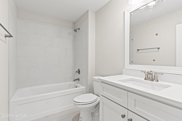 full bath featuring toilet, shower / tub combination, and vanity