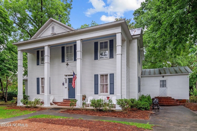 view of neoclassical / greek revival house