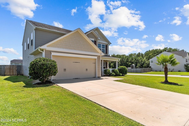 view of front facade featuring a garage and a front yard