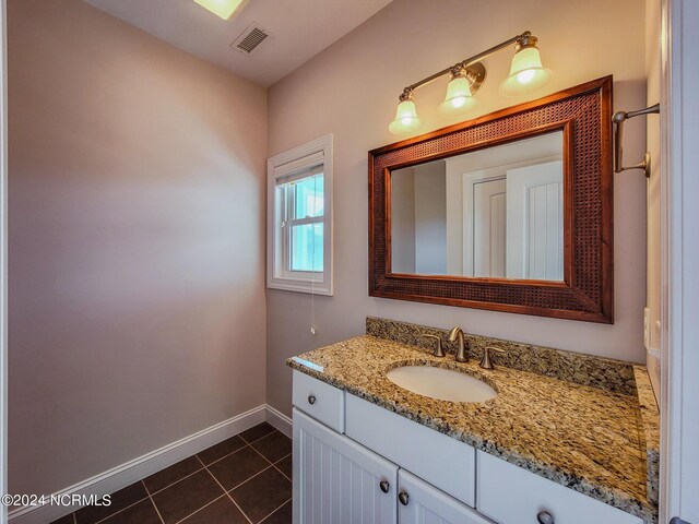 bathroom featuring vanity and tile patterned floors