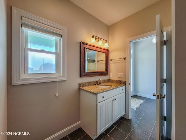 bathroom featuring vanity and tile patterned flooring