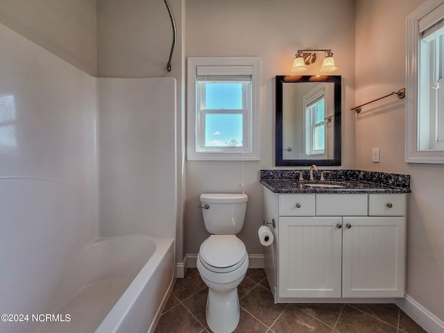 full bathroom featuring shower / bathtub combination, vanity, tile patterned floors, and toilet