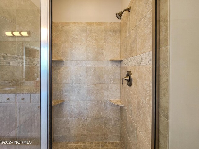 bathroom featuring an enclosed shower