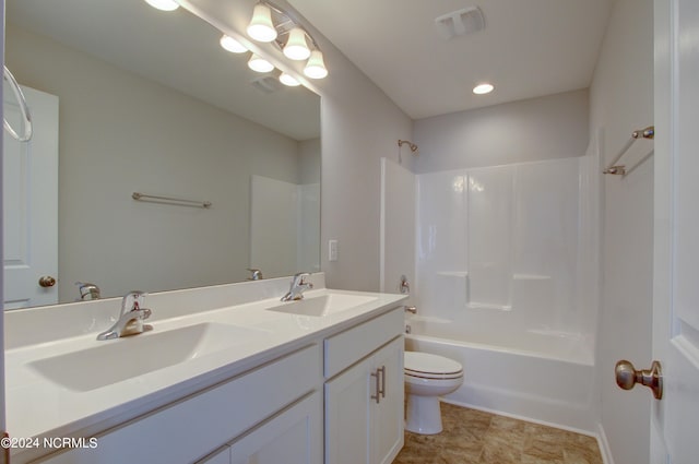 full bathroom with vanity, toilet, tile patterned floors, and shower / bath combination