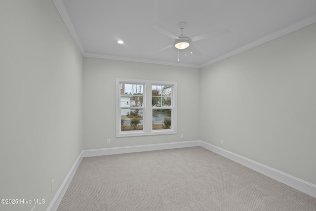 unfurnished room featuring carpet, baseboards, ornamental molding, recessed lighting, and a ceiling fan