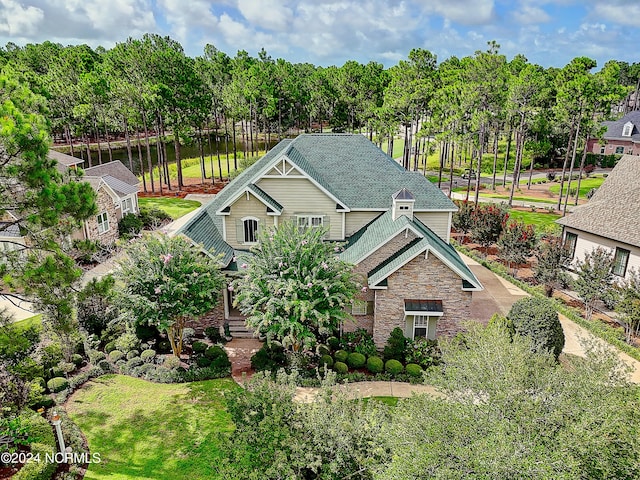 craftsman-style home with a front lawn