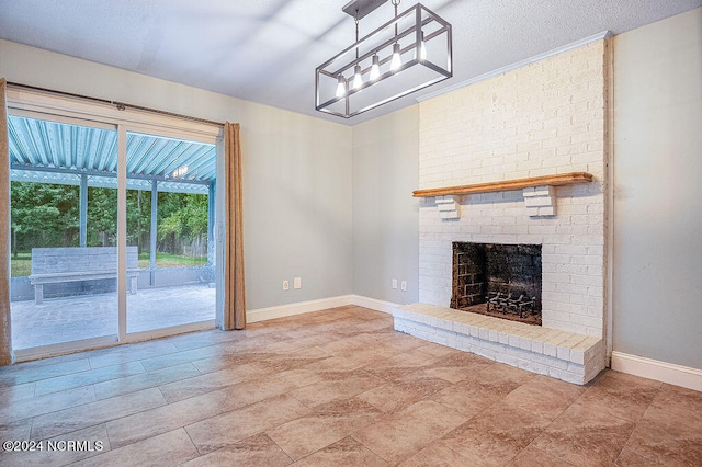 unfurnished living room featuring brick wall, a brick fireplace, tile patterned flooring, and a textured ceiling