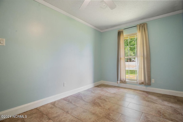 tiled spare room featuring a textured ceiling, a wealth of natural light, and ceiling fan