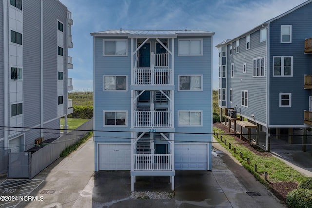 view of building exterior featuring a garage