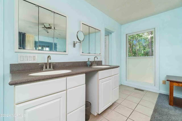 bathroom with vanity and tile patterned floors