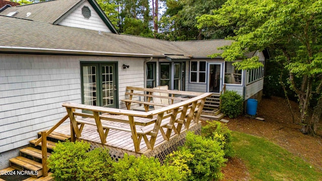 wooden terrace with a sunroom