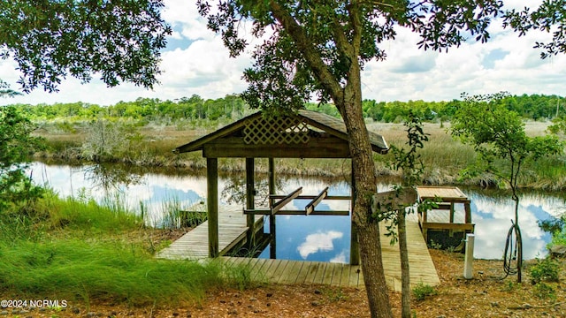 view of dock with a water view