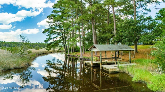 view of dock with a water view