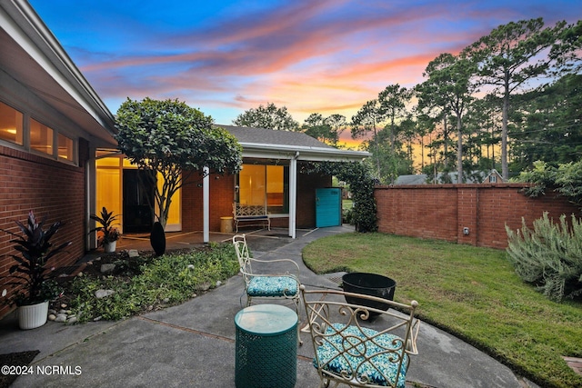 view of yard featuring a patio and fence