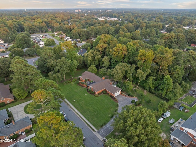 aerial view with a residential view and a view of trees