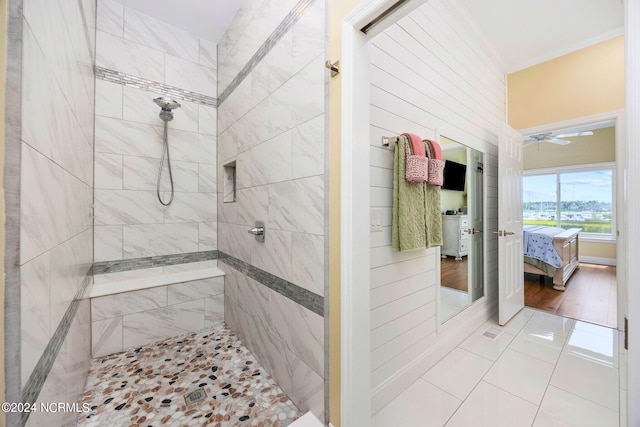 bathroom featuring a tile shower and tile patterned floors