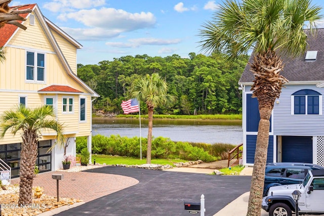 exterior space with a water view