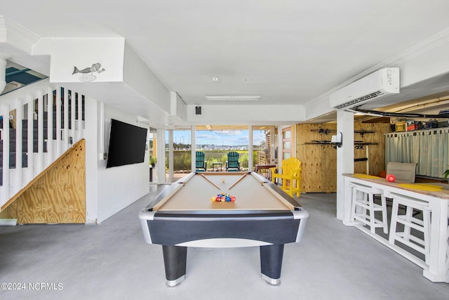 recreation room with crown molding, billiards, concrete floors, and a wall mounted AC