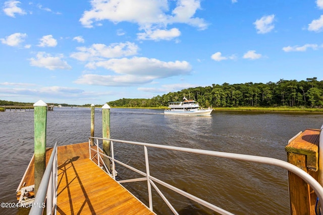 view of dock with a water view