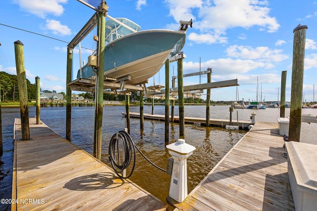 view of dock with a water view