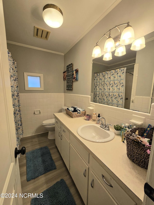 bathroom featuring crown molding, toilet, tile walls, and hardwood / wood-style flooring