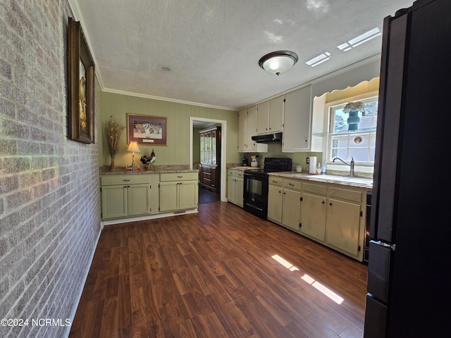 kitchen featuring sink, black electric range, a textured ceiling, stainless steel fridge, and hardwood / wood-style floors