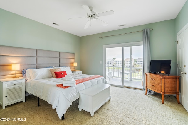 carpeted bedroom featuring access to outside and ceiling fan