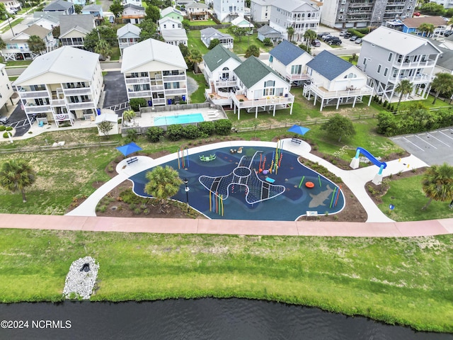 birds eye view of property featuring a water view