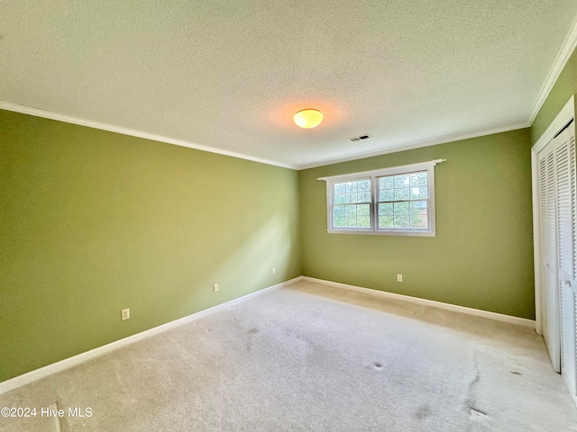 additional living space with light carpet, a textured ceiling, and lofted ceiling