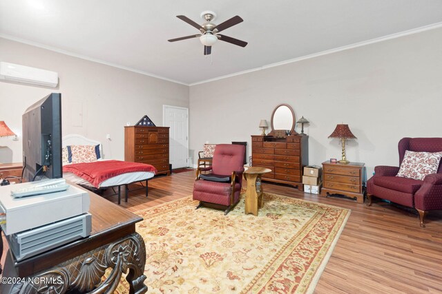 interior space featuring a wall mounted AC, crown molding, hardwood / wood-style floors, and ceiling fan