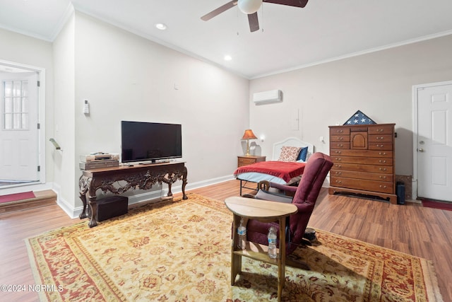 living room with hardwood / wood-style floors, crown molding, a wall mounted air conditioner, and ceiling fan