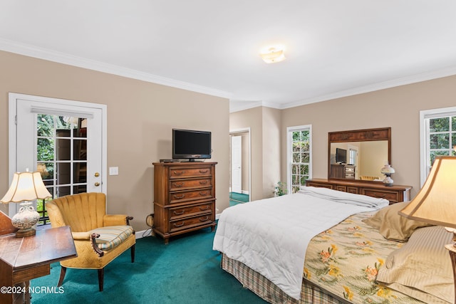 carpeted bedroom featuring ornamental molding and multiple windows