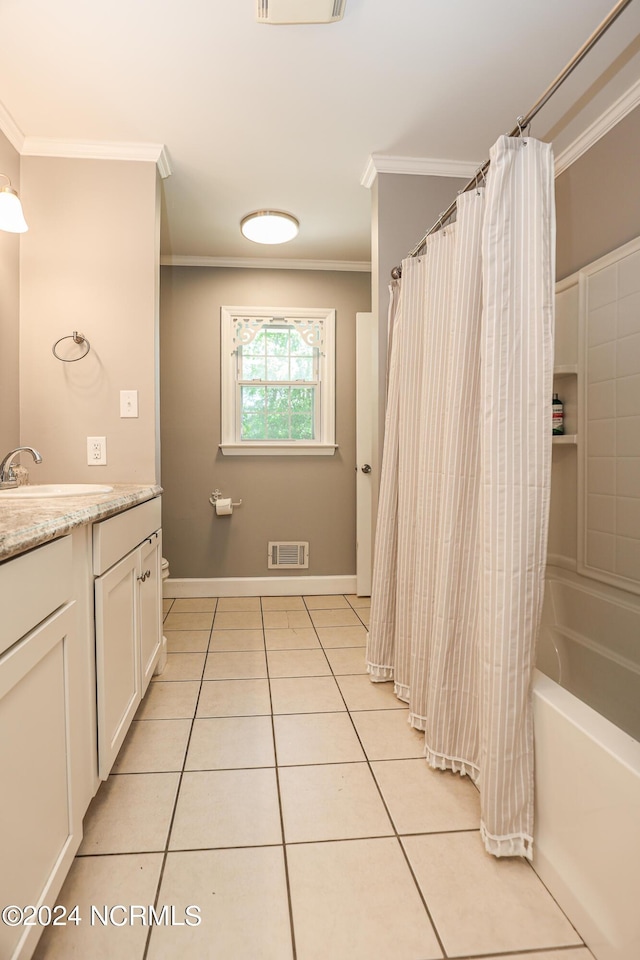 bathroom featuring ornamental molding, tile patterned floors, shower / bathtub combination with curtain, and vanity