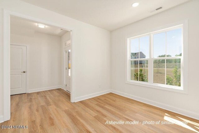 empty room with light wood-type flooring