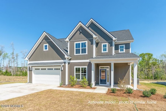 view of front of home with central AC, driveway, roof with shingles, a front lawn, and board and batten siding