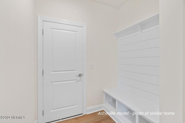 mudroom with hardwood / wood-style floors