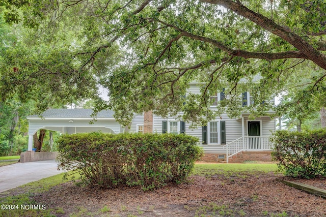 view of front of house with a carport