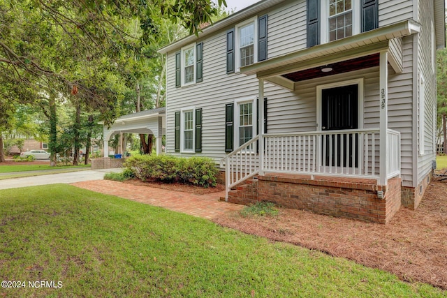 colonial inspired home with a front yard