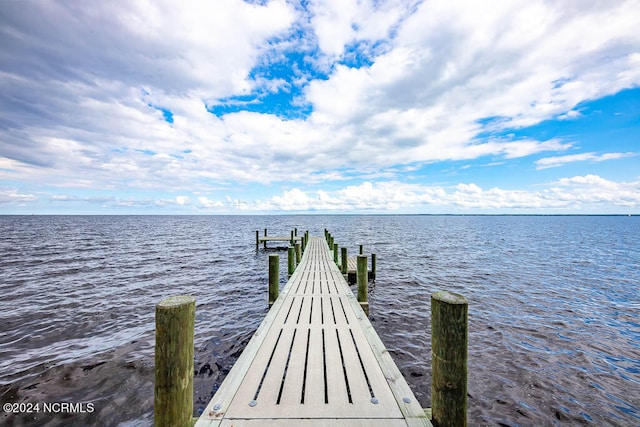 dock area featuring a water view