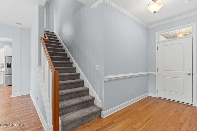 unfurnished room with ceiling fan and light wood-type flooring