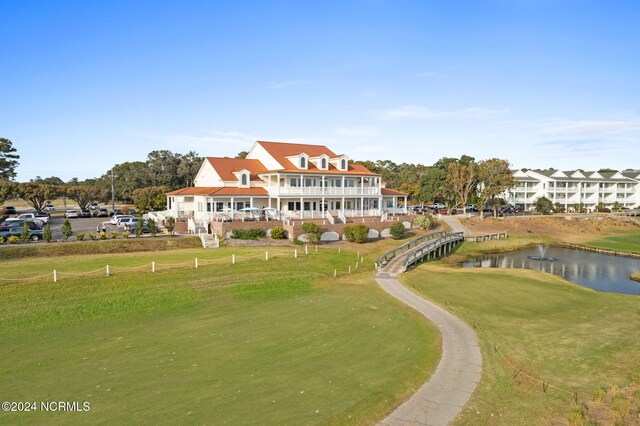 view of front facade with a garage and a front lawn