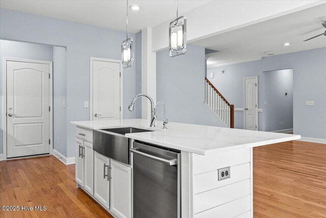 kitchen featuring appliances with stainless steel finishes, white cabinets, and decorative backsplash