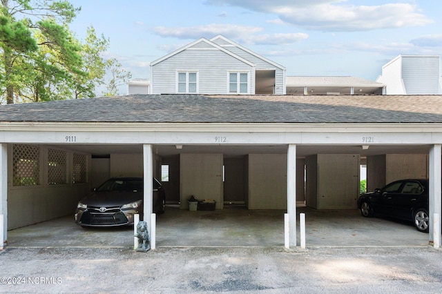 garage featuring a carport