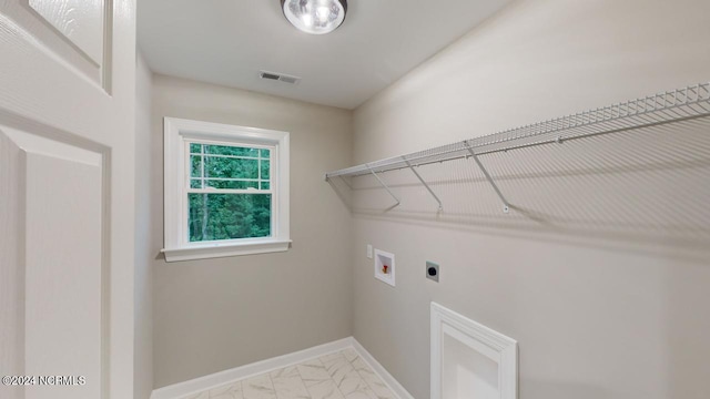 laundry room featuring hookup for a washing machine and electric dryer hookup