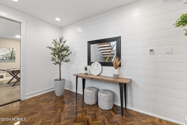 corridor featuring dark parquet floors